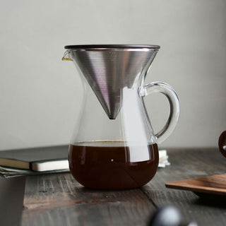 Coffee carafe with stainless pour cone top, clear glass body, side handle
