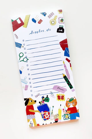 Stationery-themed notepad with blue lines and colorful doodle border