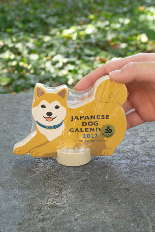 Shiba Inu die-cut desk calendar held in hand, Japanese Dog Calendar 2027 text