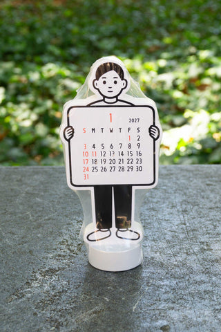 Noritake 2027 boy stand calendar, freestanding figure holding a month grid
