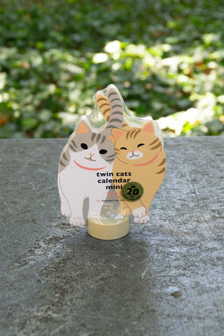 Twin cats mini die-cut calendar with cream and orange cat figures on stand