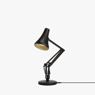 Carbon black mini desk lamp with angled conical shade and articulated arm