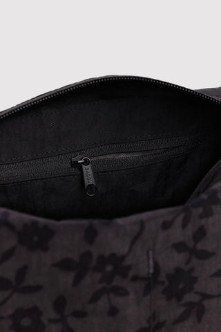 Charcoal floral toiletry bag interior with zipper and metal pull