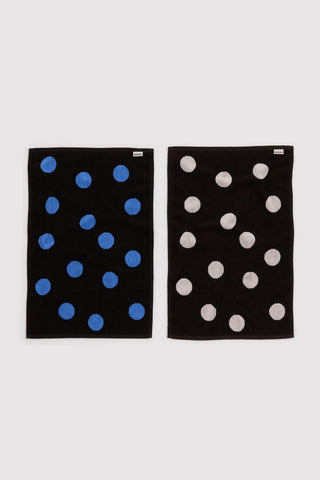 Polka dot hand towel set of 2: blue dots on dark and white dots on dark towels.