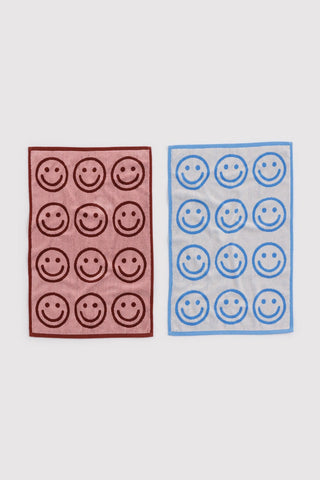 Set of 2 hand towels with smiling face icons, sky blue and blush pink colors