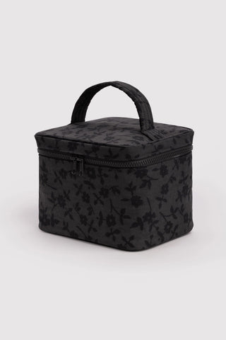Large cosmetic case in charcoal with allover ditsy floral, top handle and zip closure
