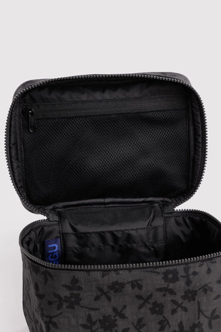 Large cosmetic case interior view, mesh pocket and zippered compartments in charcoal floral