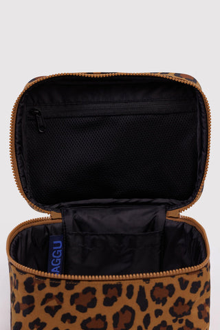 Leopard cosmetic case interior with black lining and open mesh pocket