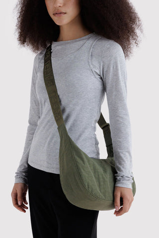 Crescent nylon crossbody bag in olive green with adjustable strap