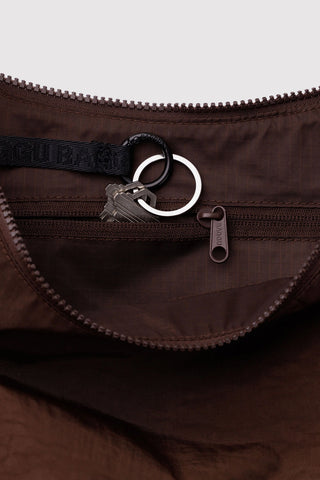 Medium crescent nylon bag with zipper opening, inner pocket, and metal ring key clip