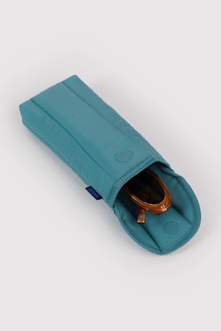 Teal puffy glasses sleeve, side view with open pocket and button