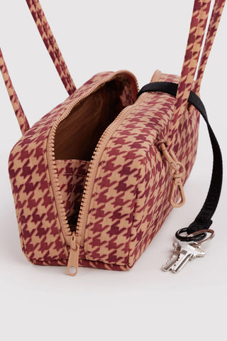 Small houndstooth bowler bag open with zipper pocket and tan interior