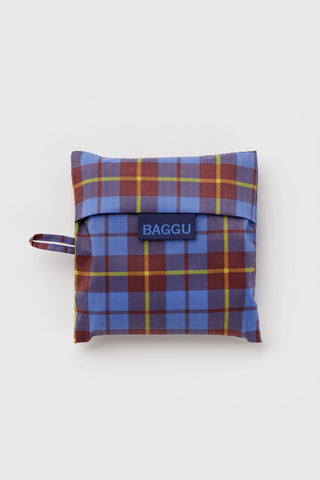 Foldable BAGGU tote pouch in blue tartan plaid with strap and logo