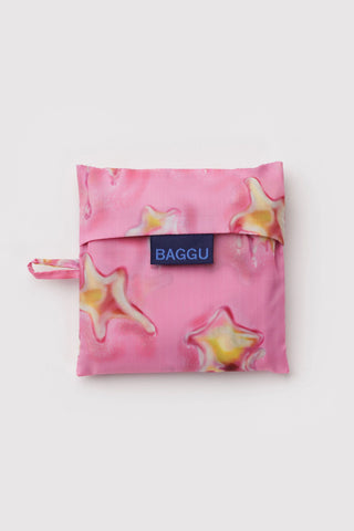 BAGGU tote storage pouch in pink Dancing Star print with blue BAGGU label