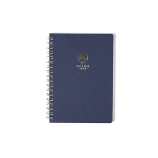 Navy lined notebook with spiral binding and BEAMS Japan logo centered on cover.