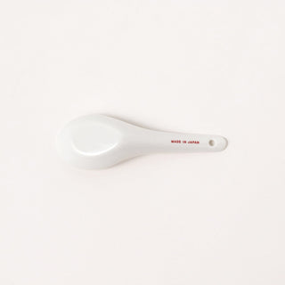 White ceramic soup spoon by BEAMS Japan, underside with 'MADE IN JAPAN' text