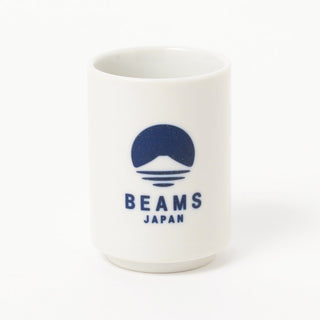 White sushi cup with blue BEAMS Japan logo on the front.