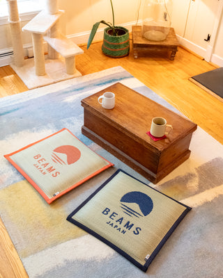 Hagihara x BEAMS Japan cushion set: square orange and navy woven cushions with logos