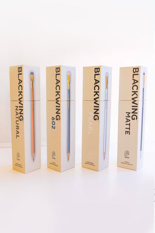 Blackwing pencil boxes displaying four styles: Natural, 602, Pearl, and Matte Black