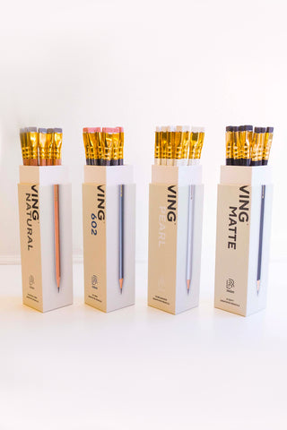 Four boxed Blackwing pencils with golden tips: Natural, 602, Pearl, Matte Black