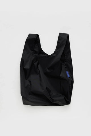 Black Baby BAGGU reusable tote bag with crinkled nylon and long handles
