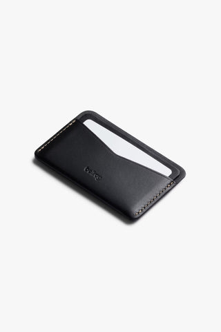 Bellroy black leather card slip with front card slot and stitched edges