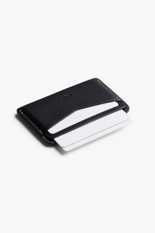 Bellroy black card slip wallet with open card holder showing white card stock