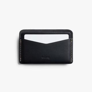 Bellroy black leather card slip with open card sleeve and visible stitching