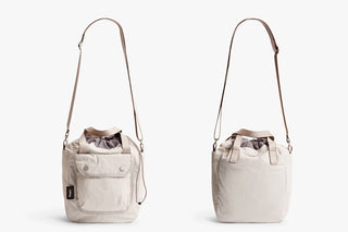 Oat cinch bucket bag front and side views with drawstring top and shoulder strap