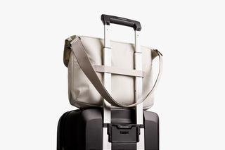 Oat light-beige messenger bag with luggage strap and crossbody handle
