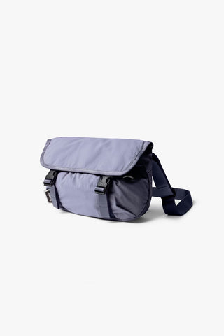 Lilac mini messenger bag with flap and adjustable webbing shoulder strap