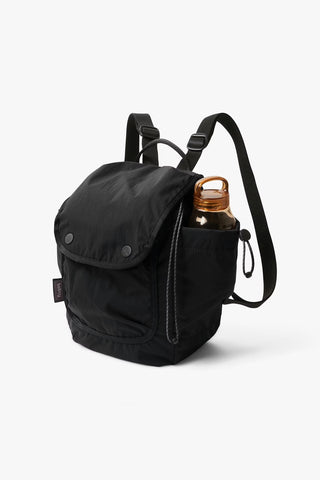 Black mini backpack crossbody with top handle, front flap pocket, and adjustable strap