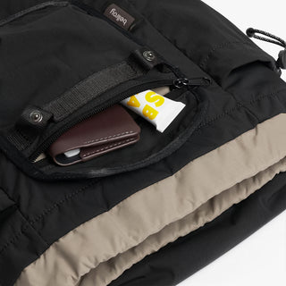 Black mini backpack front zip pocket with small card case and tag key loop