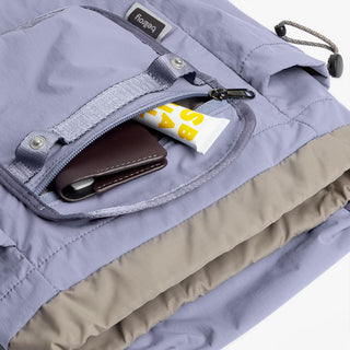 Lilac mini backpack open pocket holding cards and small items