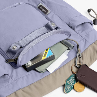 Lilac mini backpack front panel with snap strap and organizer pocket