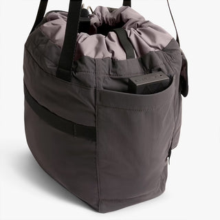 Bellroy cinch tote in charcoal with top drawstring and front panel stitching