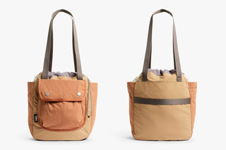 Tan cinch tote shown from front and back with front flap pocket