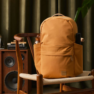 Bellroy Classic Daypack in tan, front view with padded back and logo patch