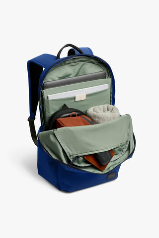 Bellroy Classic Daypack in indigo blue, open front showing interior compartments
