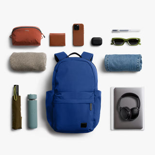 Bellroy Classic Daypack indigo blue shown with accessories in a product layout