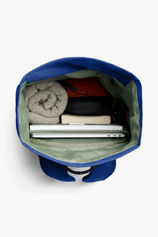 Bellroy indigo rolltop backpack top opening showing neatly packed contents