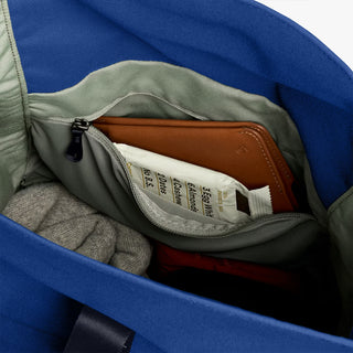 Bellroy indigo rolltop backpack interior pocket with brown leather card holder