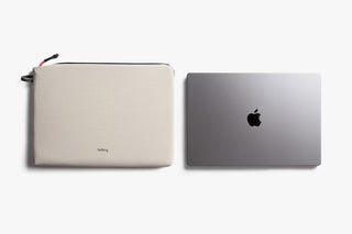 Bellroy Lite laptop sleeve, ash exterior with zipper; dark laptop sleeve side shown with Apple