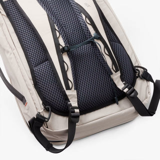 Light gray backpack with mesh back panel and adjustable shoulder straps