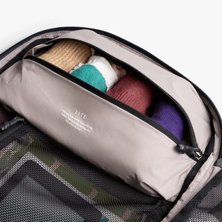 Black bellroy backpack interior organizer pouch with colorful sleeve inserts