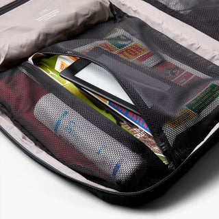 Black bellroy backpack open organizer with elastic mesh sleeves and zip pocket
