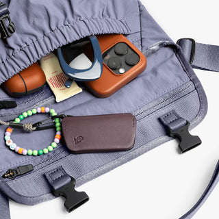 Lilac mini messenger bag organizer view with zip pocket and card holder slot