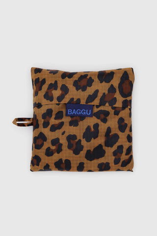 Leopard print BAGGU pouch with front logo patch and small side wrist strap