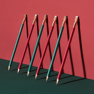 Pencil set with matte red and teal barrels, gold tips, multiple sharpened points