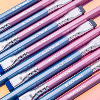 Close-up of Blackwing pencils with metal ferrules and colored barrels
